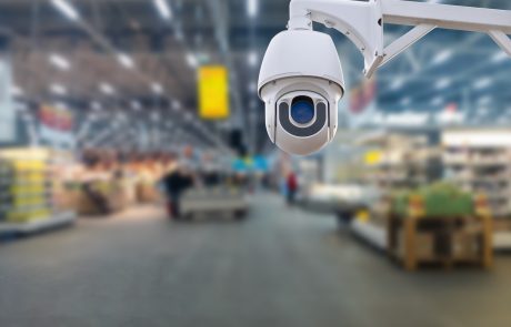 Surveillance,Camera,Shopping,Department,Store,On,The,Background.